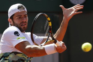 Italy's Simone Bolelli returns in the third round match of the French Open 