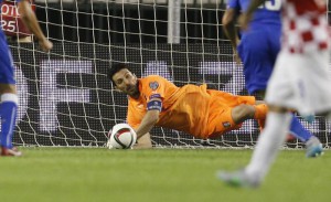 Italy's goalkeeper Gianluigi Buffon saves a penalty shot 