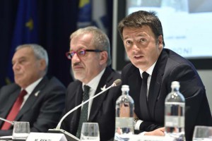Italian Premier Matteo Renzi (R) speaks during the Italian-Latin American and Caribbean Conference