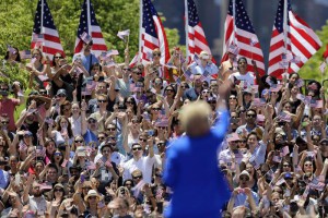 Hillary Rodham Clinton waves to supporters Saturday