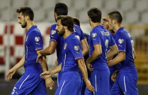 Italy players celebrate their equalizing goal