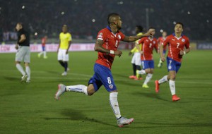 Chile's Arturo Vidal celebrates after scoring a penalty kick during a Copa America