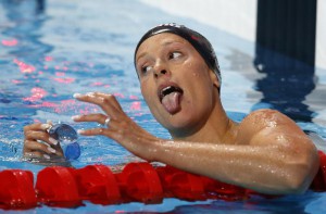 Italy's Federica Pellegrini sticks out her tongue after a women's 200m freestyle semifinal at the Swimming World Championships in Kazan, Russia,  (ANSA/AP Photo/Sergei Grits)