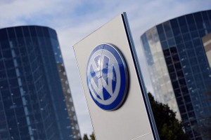 The corporate logo of Volkswagen (VW) in front of the storage towers of Volkswagen's Autostadt (car city) in??Wolfsburg, Germany, 25 September 2015. ANSA/RAINER JENSEN