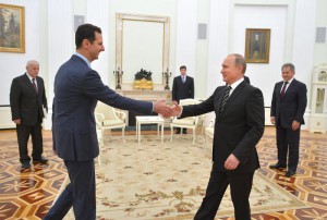 A picture made available on 21 October 2015 shows Russian President Vladimir Putin (R) shaking hands with Syrian President Bashar al-Assad during their meeting at the Kremlin in Moscow, Russia, 20 October 2015.  EPA/ALEXEY DRUZHINYN/RIA NOVOSTI/POOL