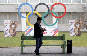 A man walks outside the Russian Olympic Committee headquarters and Russian Athletics Federation office in Moscow, Russia, 10 November 2015. EPA/MAXIM SHIPENKOV