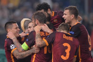 AS Roma's Miralem Pjanic (3L) celebrates with teammates after scoring the 3-2 goal during the UEFA Champions League group E soccer match AS Roma vs Bayer 04 Leverkusen at the Olimpico stadium in Rome, Italy, 04 November 2015. ANSA/MAURIZIO BRAMBATTI