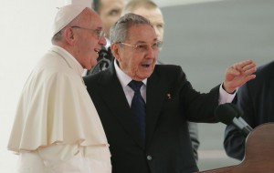 Pope Francis speaks with Cuba's President Raul Castro during his arrival ceremony at the airport in Havana, Cuba, Saturday, Sept. 19, 2015. (ANSA/AP Photo/Ramon Espinosa)