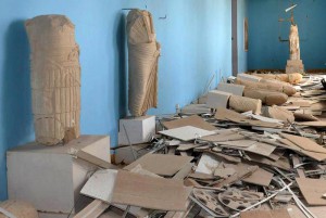 This photo released on Sunday March 27, 2016, by the Syrian official news agency SANA, shows destroyed statues at the damaged Palmyra Museum, in Palmyra city, central Syria. The amount of destruction found inside the archaeological area in the historic town  was similar to what experts have expected but the shock came Monday from inside the local museum where the extremists have caused wide damage demolishing invaluable statues that were torn to pieces. (SANA via AP)