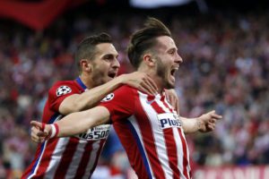 Atletico Madrid's player Saul Niguez (R) celebrates with Koke (L) after scoring the opening goal during the UEFA Champions League semifinal first leg soccer match between Atletico Madrid and Bayern Munich played at the Vicente Calderon stadium, in Madrid, Spain, 27 April 2016.  EPA/Juan Carlos Hidalgo