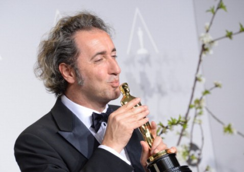 Paolo Sorrentino in una foto d'archivio durante la premiazione degli Oscar nel 2014.